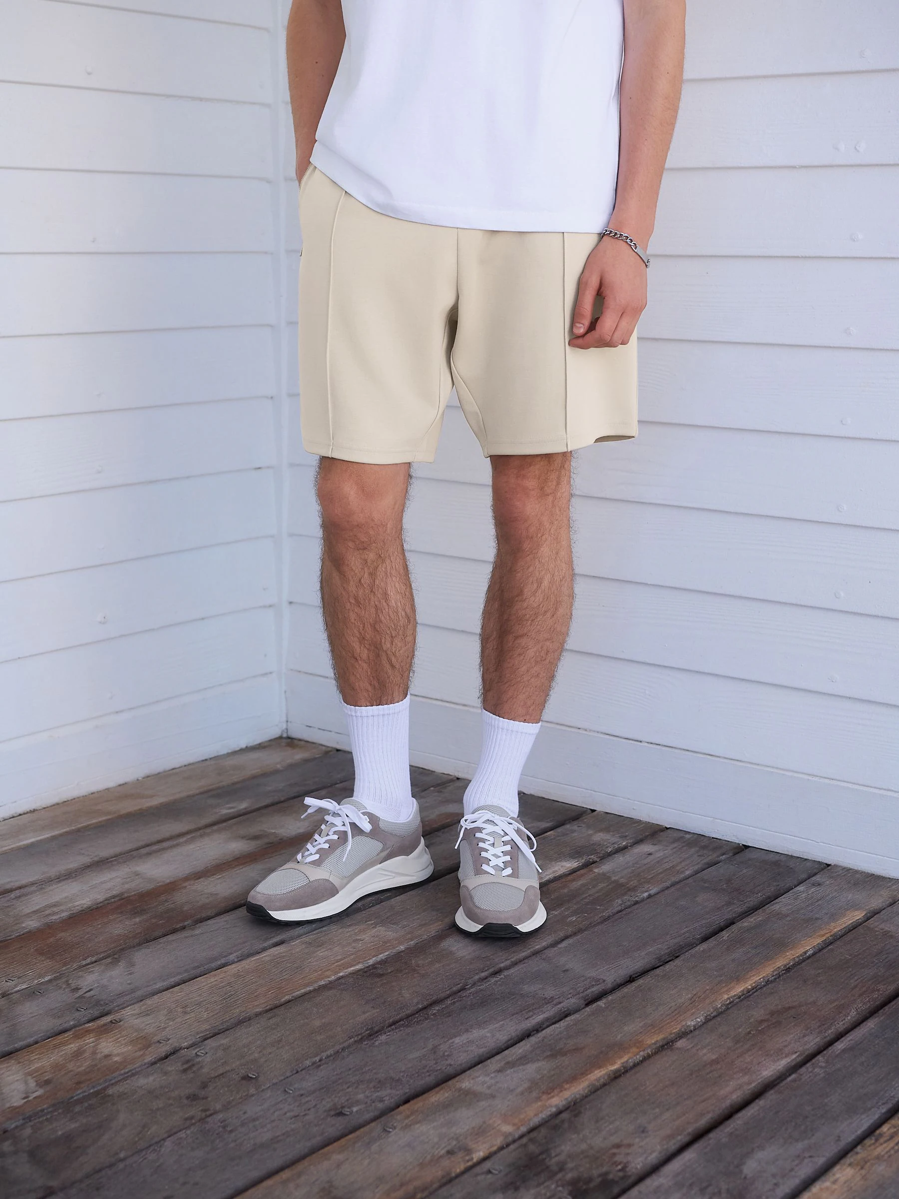 Pastelgeel - Slim-fit jersey shorts met slimme ritszakken