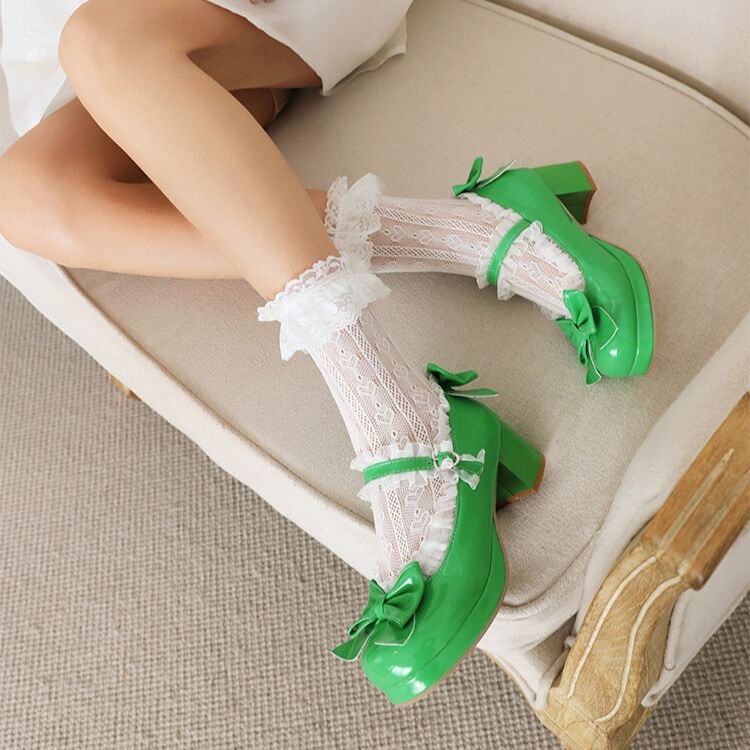 Niuna - Mary Jane pumps met dikke hak, strikaccent en ruches van lakleer