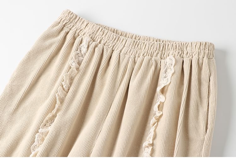 CosmoCorner - Corduroy cropped harembroek met elastische taille en bloemenaccent