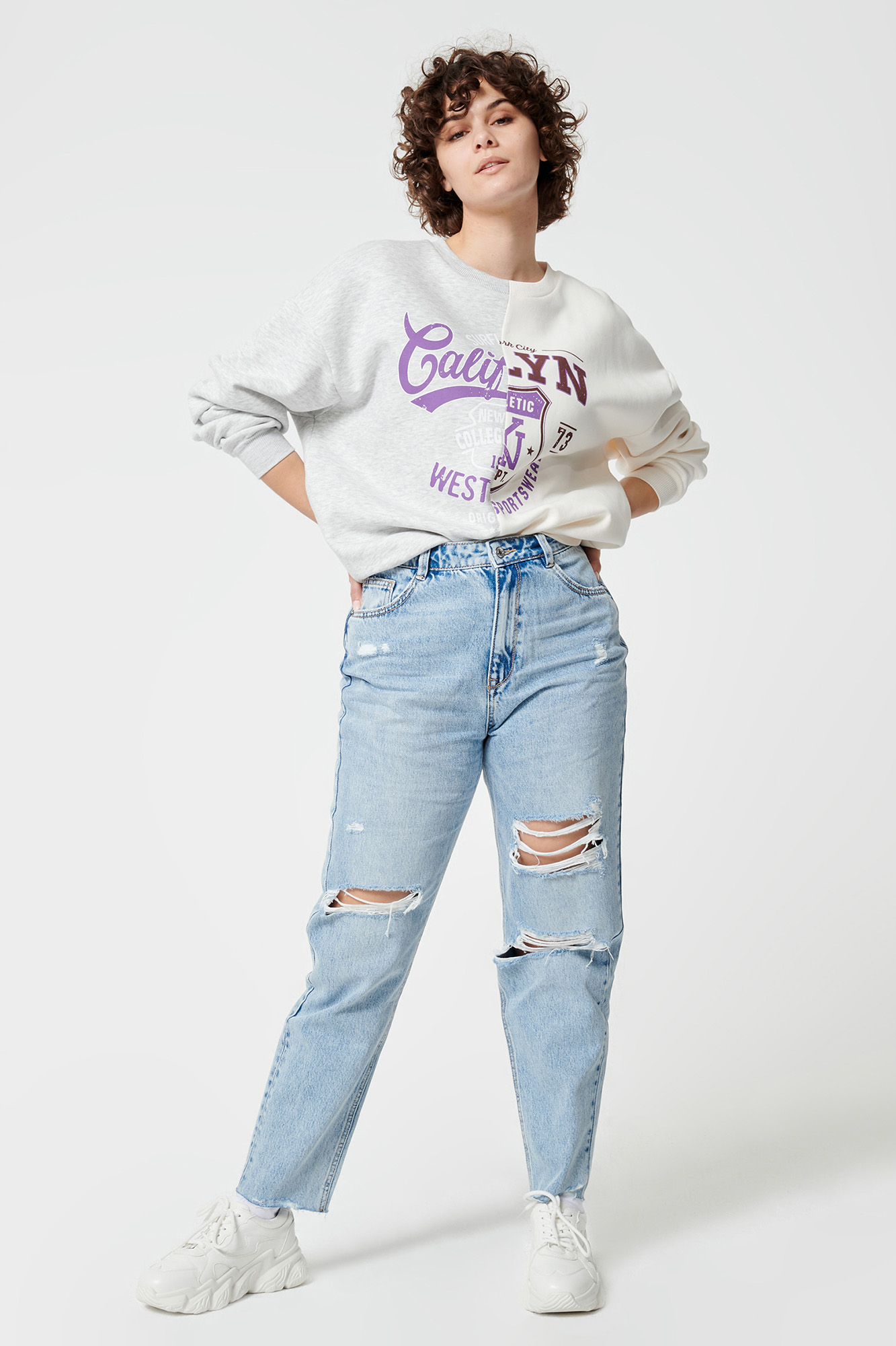 calças jeans mom desgastadas