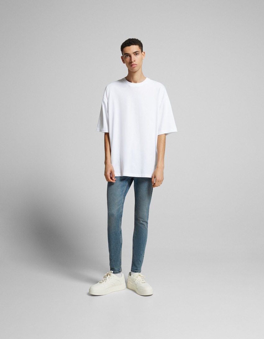 calças jeans super skinny