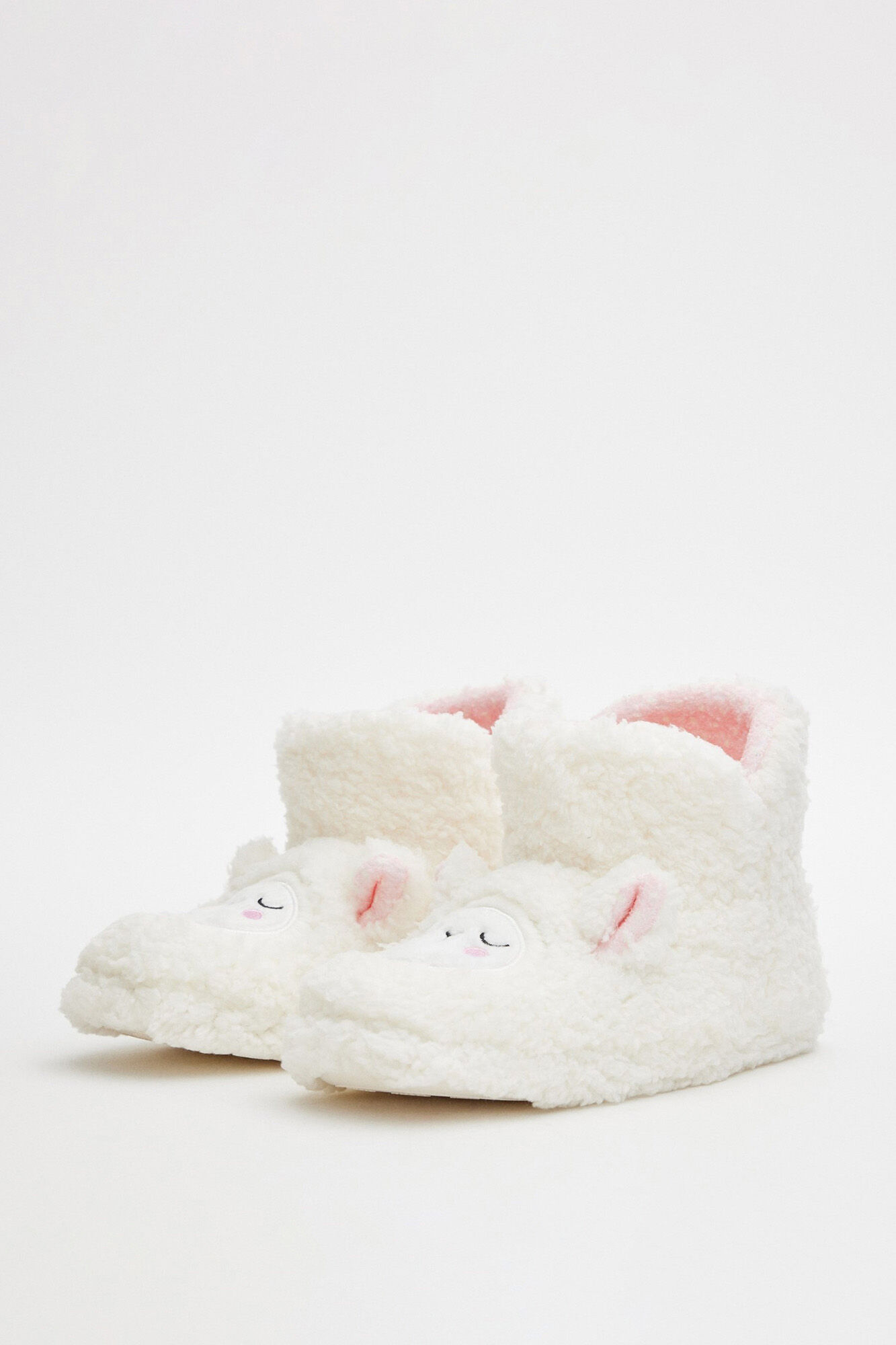 Botas de cano curto de pele de carneiro