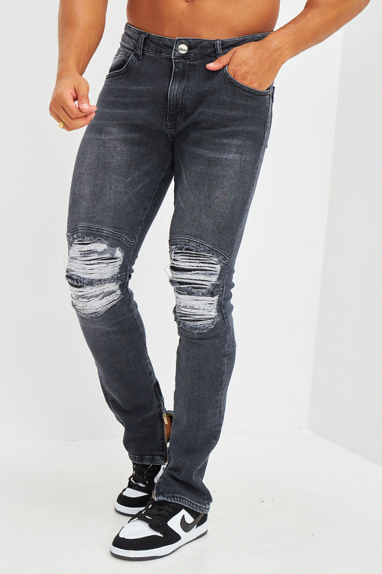 Jean effet déchiré aux genoux noir délavé