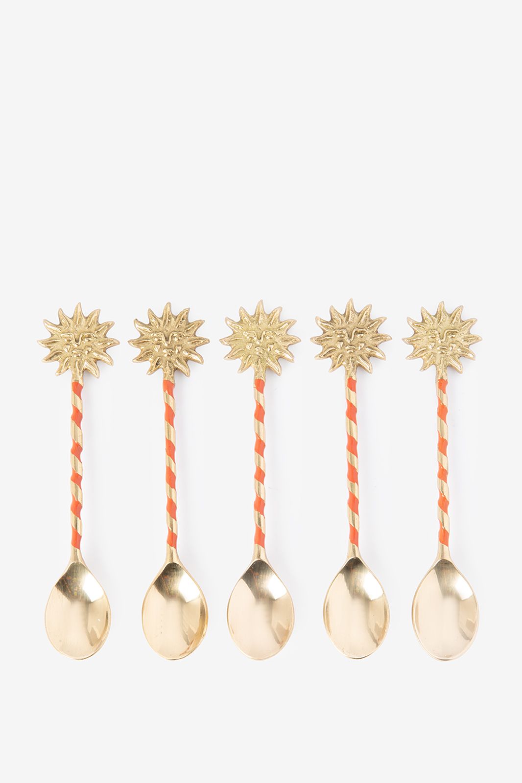 Goudkleurige theelepels met zonnetje