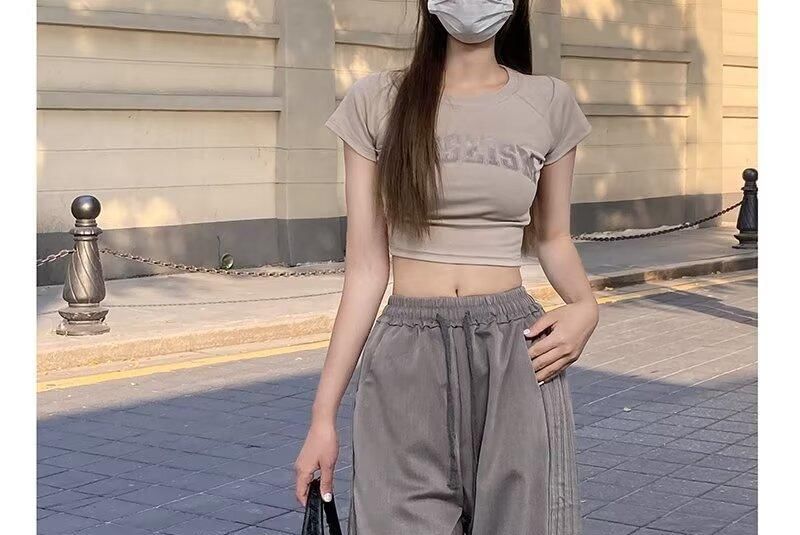 Rosesand - Hoge taille effen gestreepte losse wijde joggingbroek