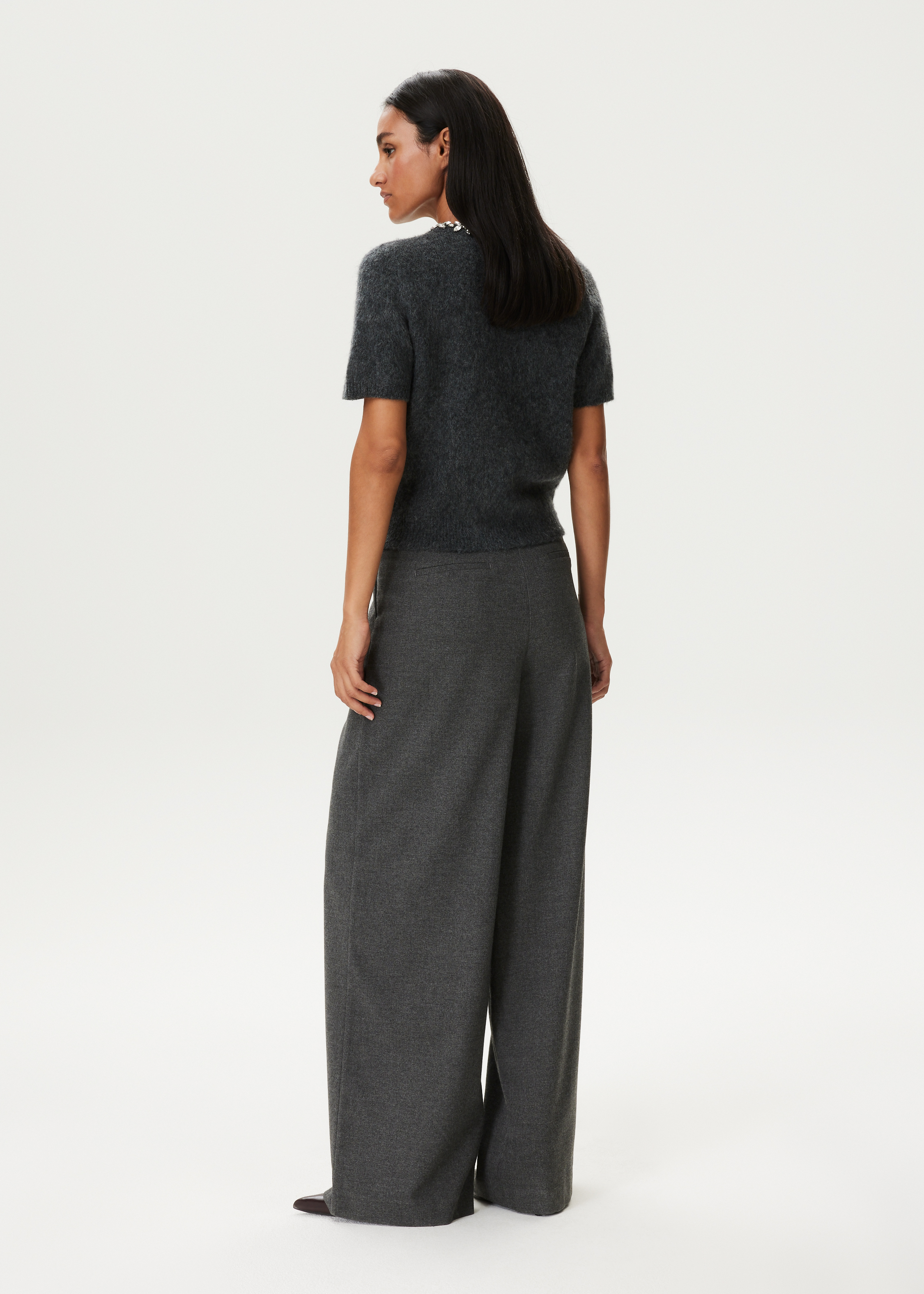 Wijde broek geplooid