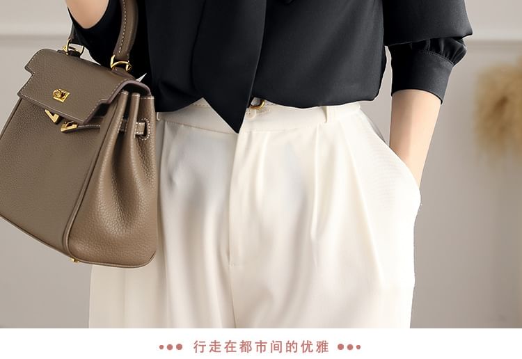 Jeonseon - Blouse met lange mouwen en strikkraag
