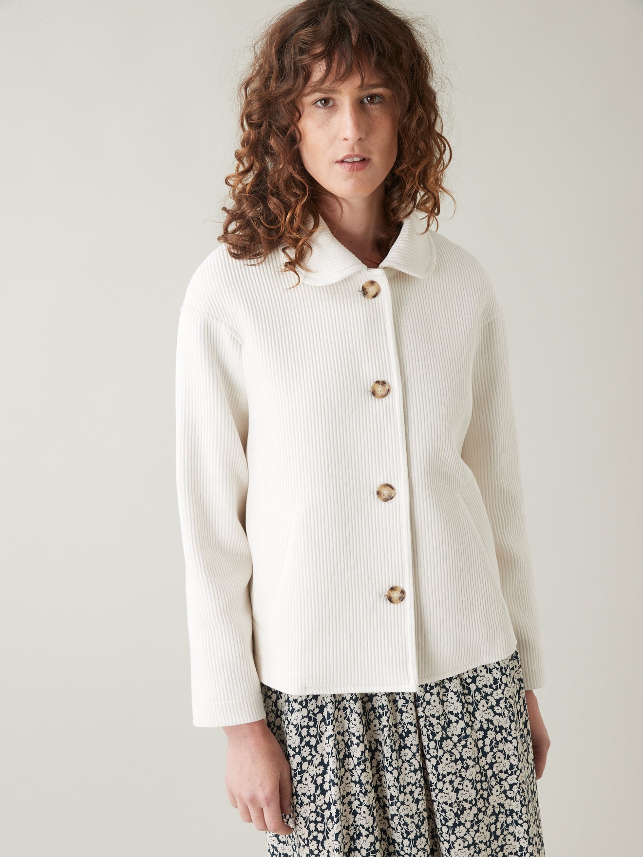 Manteau court tissu natté femme