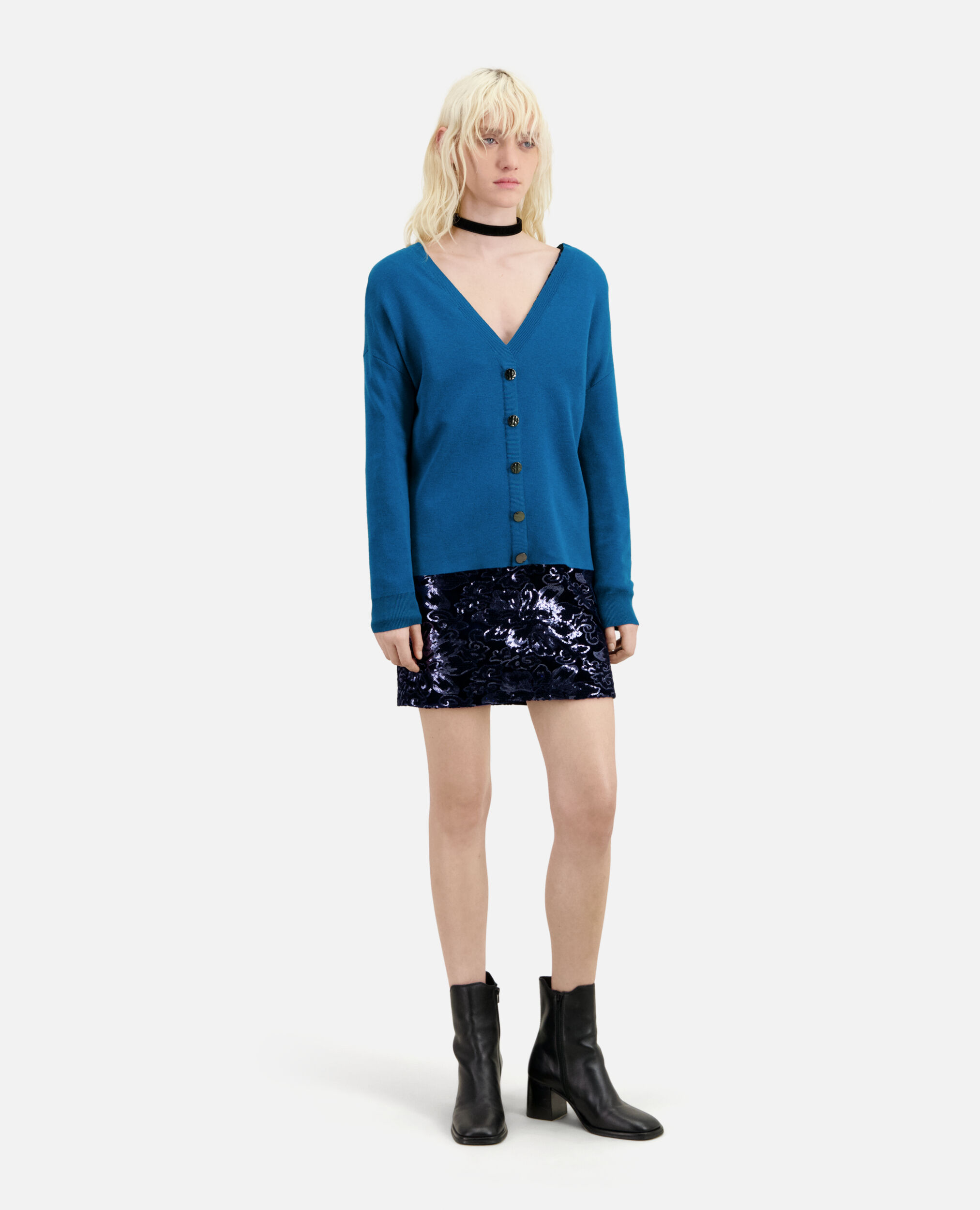 Blue sweater with buttoning on the back
