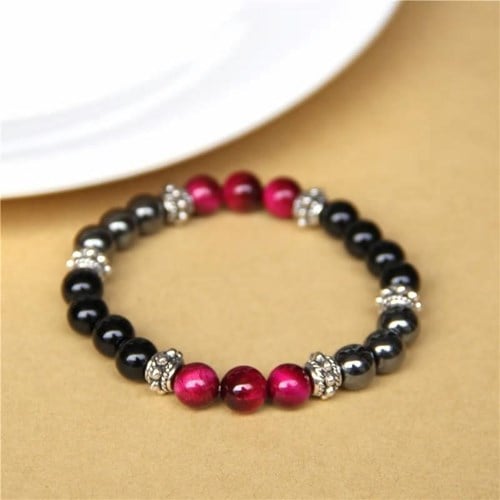 Bracelet protection en œil de tigre rose