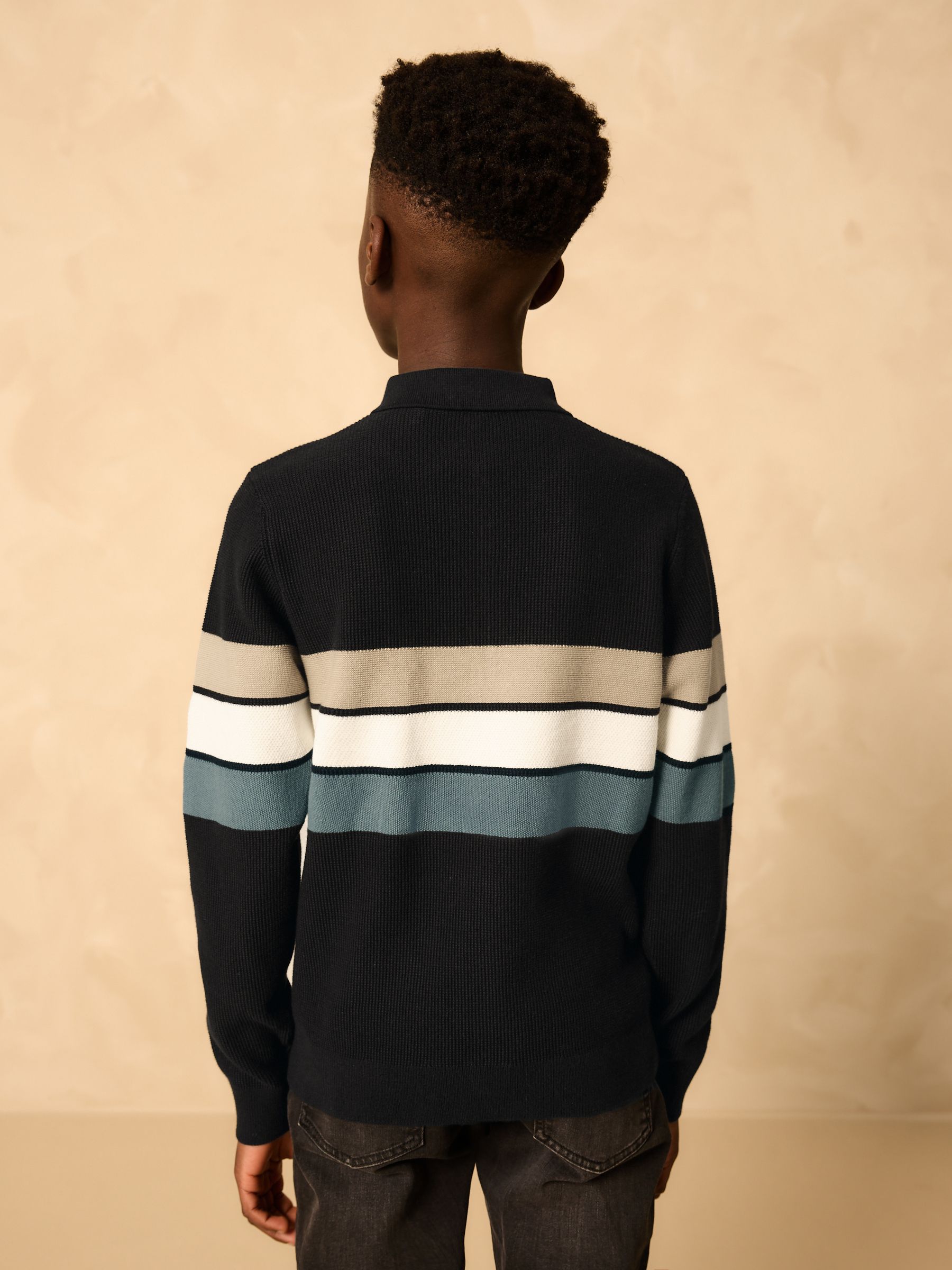 Zwarte streep - Gebreid poloshirt met rits bij de hals en lange mouwen (3-16jr)