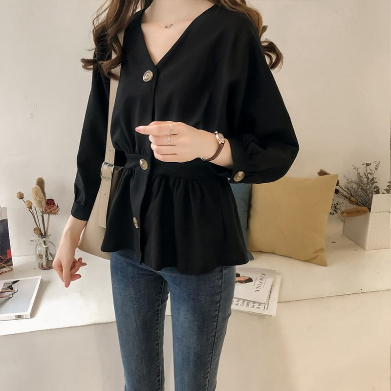Areumdaun - Blouse met pofmouwen, V-hals en effen peplum