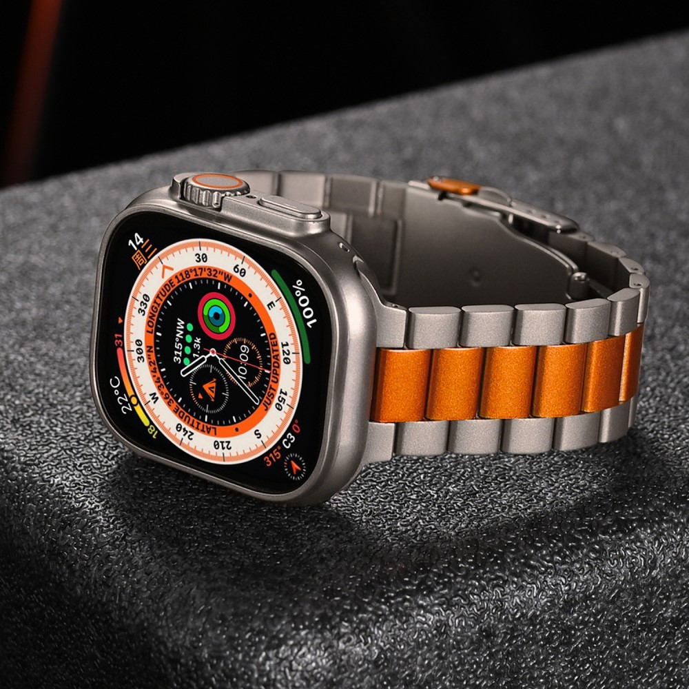 Apple Watch (49/46/45/44 mm) Edelstahl Armband in zweifarbigem Muster mit Faltschliesse - Silber / Orange