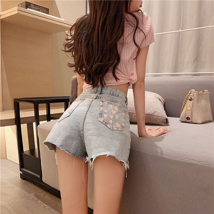 Sadelle - Denim hotpants met hartjesprint en zakken