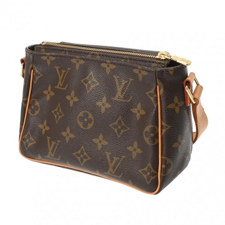Louis Vuitton Vintage Louis Vuitton Cite Brown