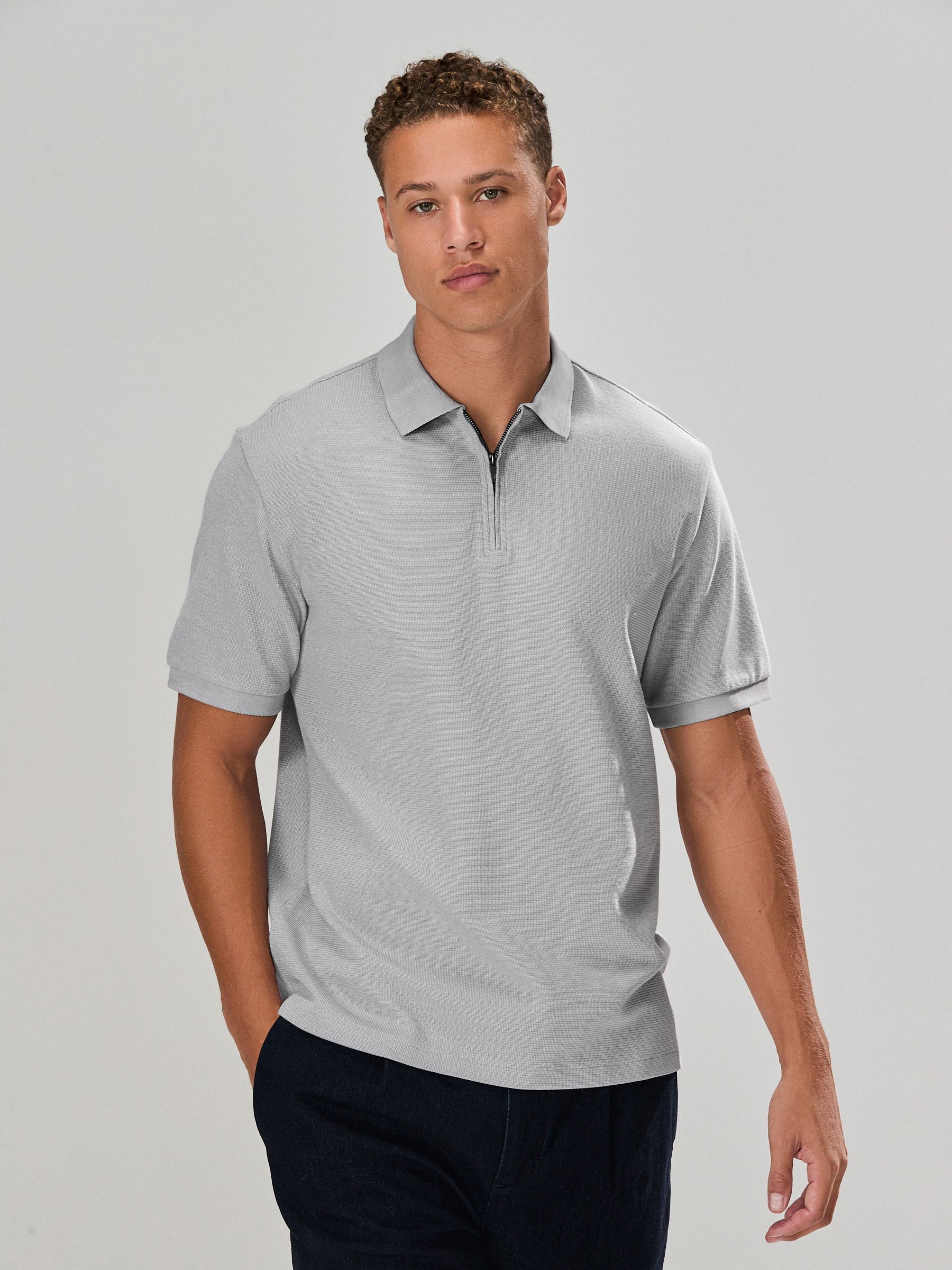 Grijs - Smart poloshirt met textuur en rits