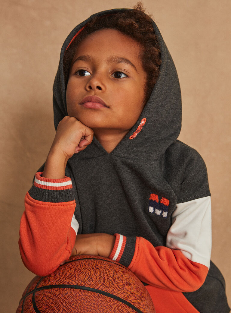 Sweat à capuche orange et blanc
