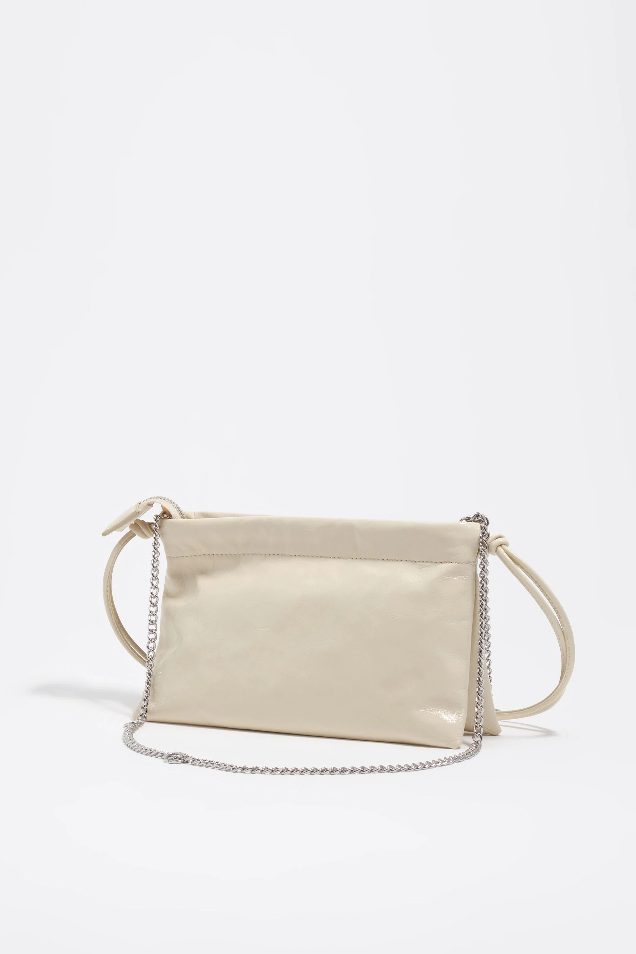 Mini bolsa de mão em couro brilhante cor marfim