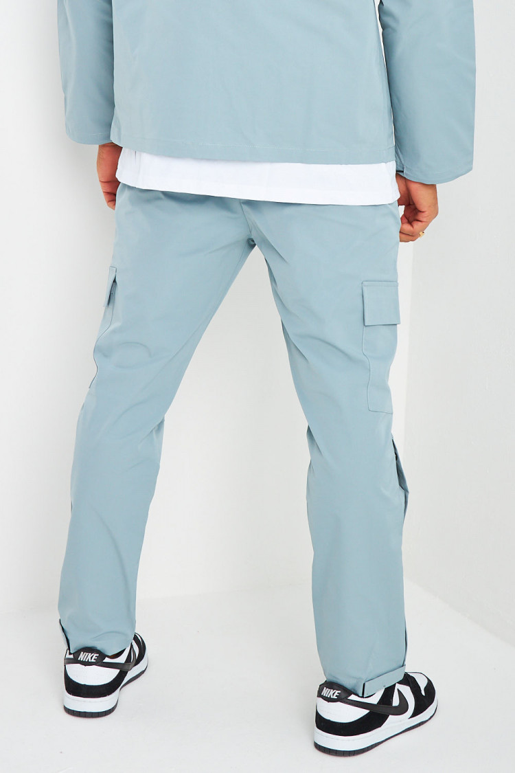 Ensemble de jogging veste + pantalon bleu grisé à boutons