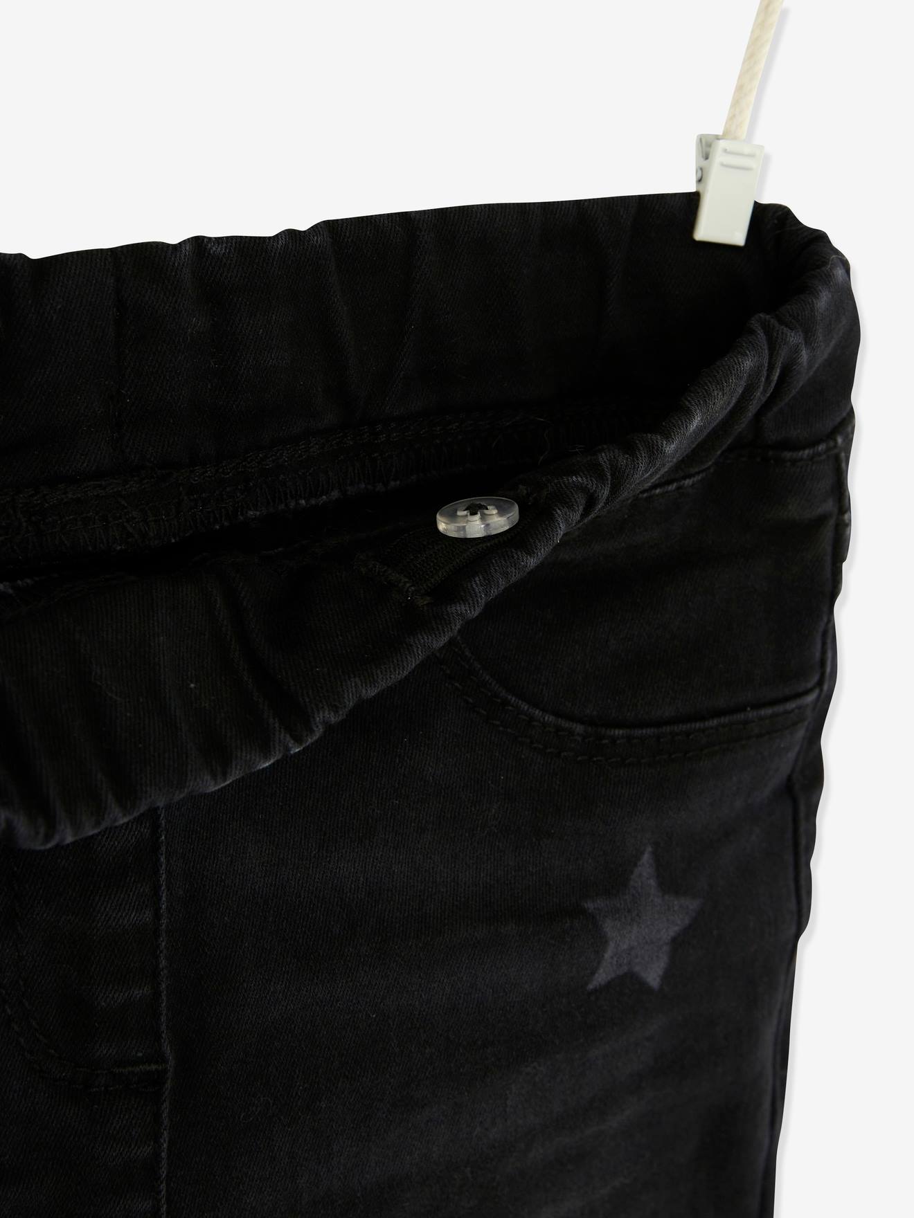Calça legging infantil com estampa a laser, na cor azul médio lisa com detalhes.
