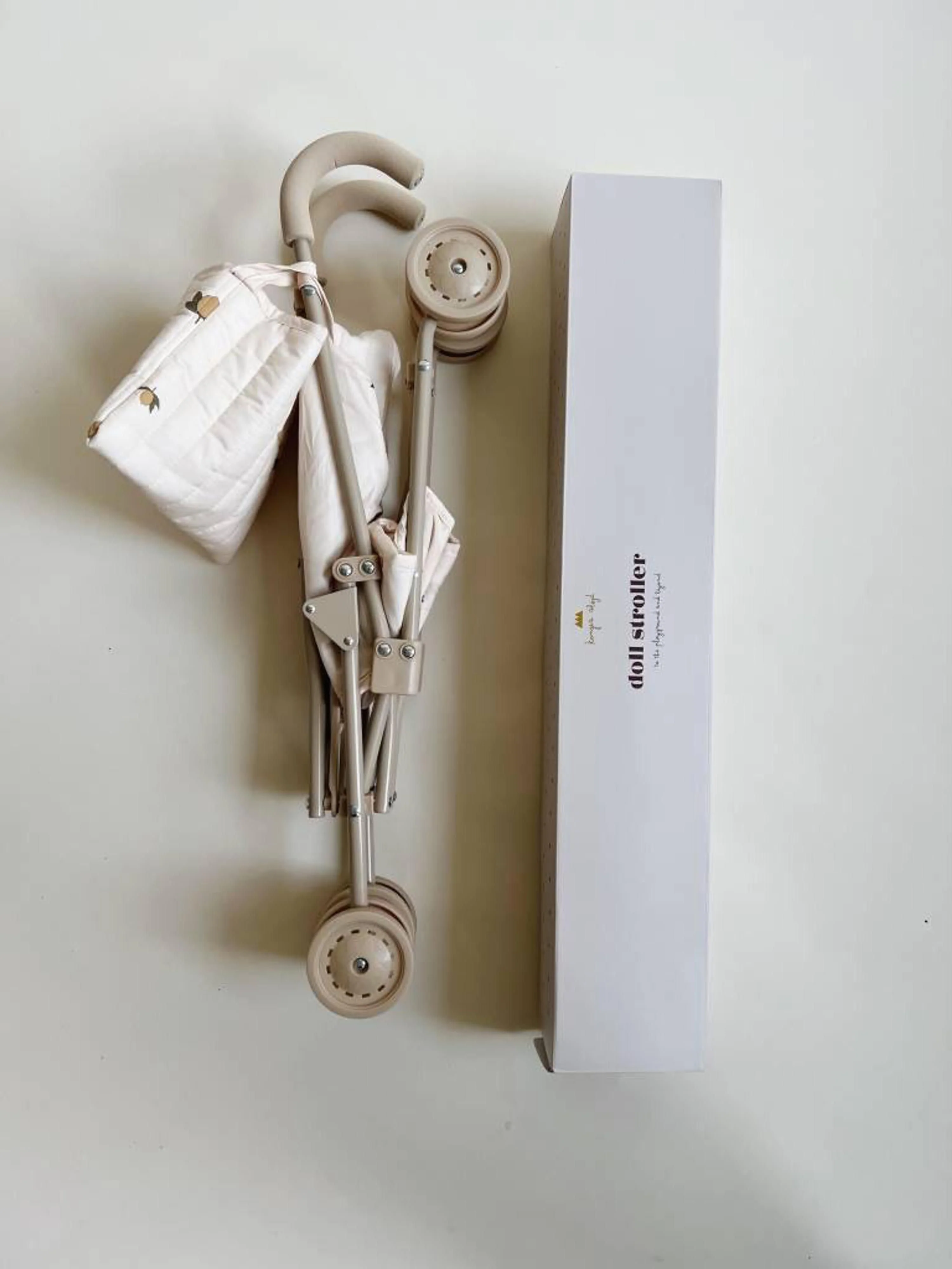 Poppenwagen Lemon riem en draagtas