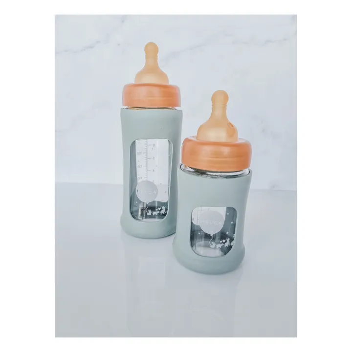 Hevea Biberon en verre à col large avec housse de protection Débit moyen | Vert amande