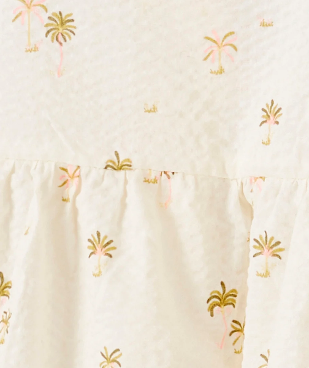 ROBE BÉBÉ FILLE EN COTON GAUFRÉ ÉCRU IMPRIMÉ PALMIERS