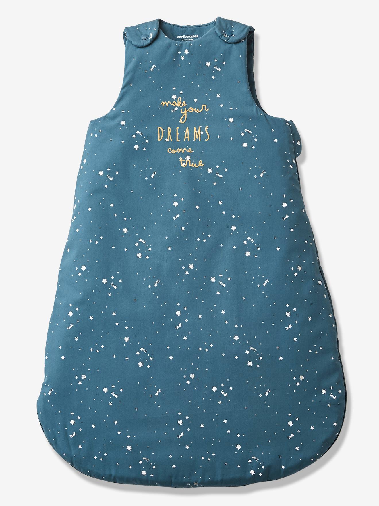 Saco de dormir liso azul escuro com estampa de urso polar e mangas removíveis.