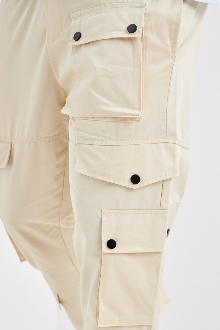 Pantalon beige cargo zippé aux chevilles