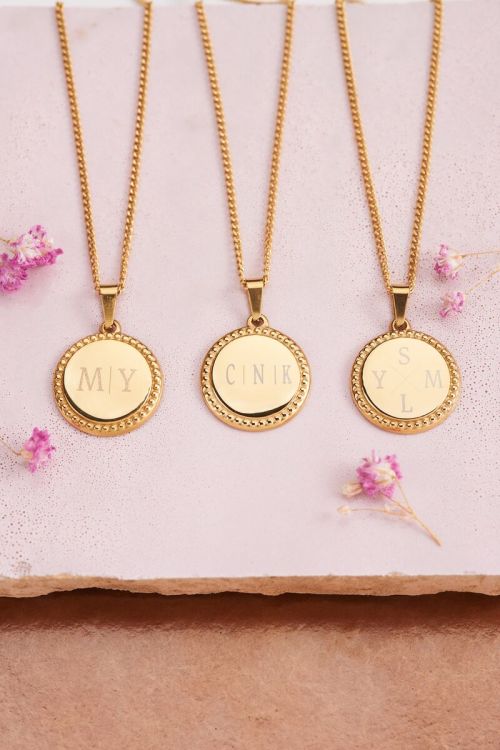 Atelier korte ketting met ronde bedel