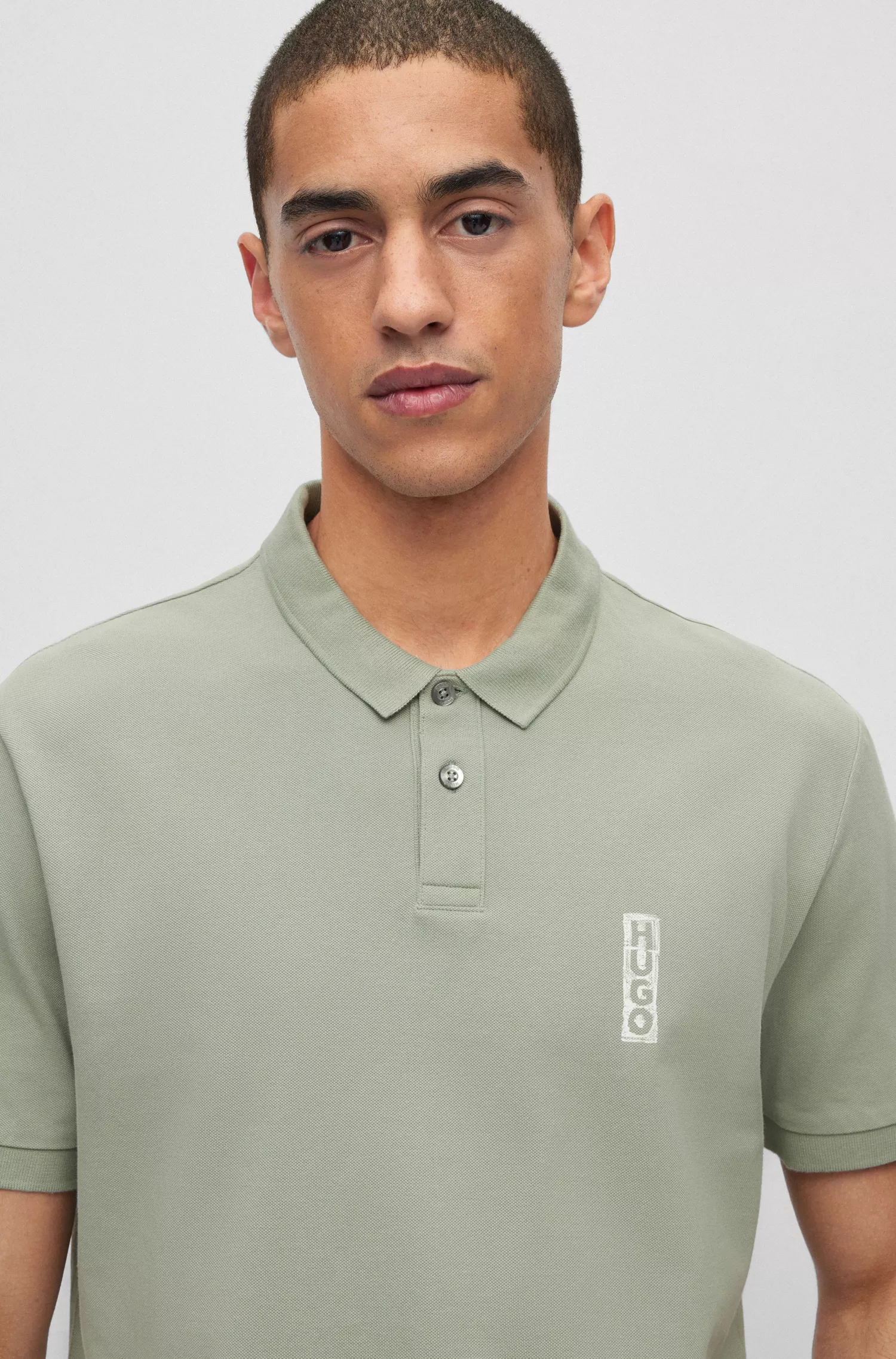 Camisa polo HUGO vermelha em piqué de algodão com logotipo inspirado em marcador.
