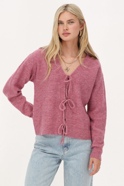 Roze vest met strikjes