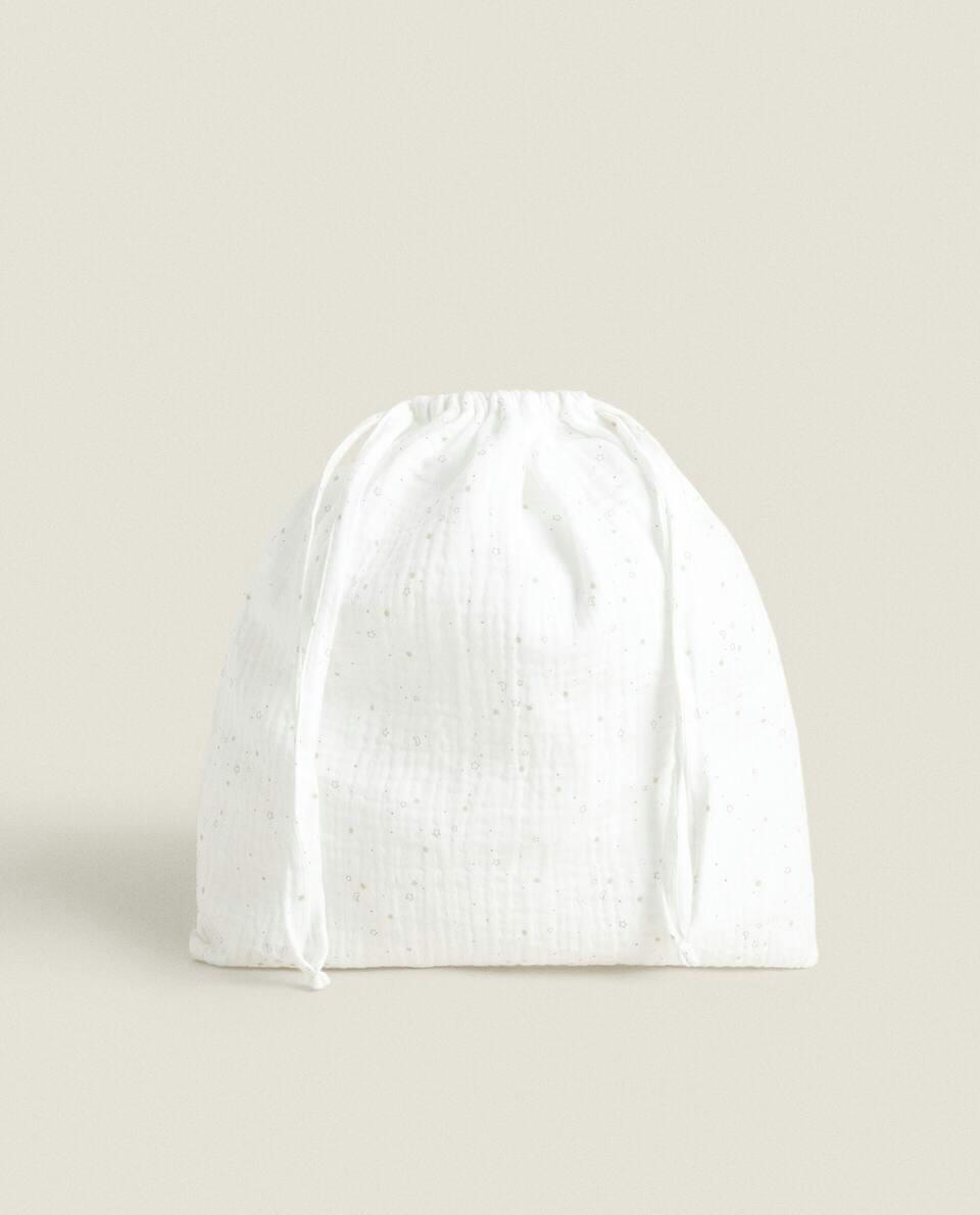 SACO DE ROUPA PEQUENO COM ESTRELA