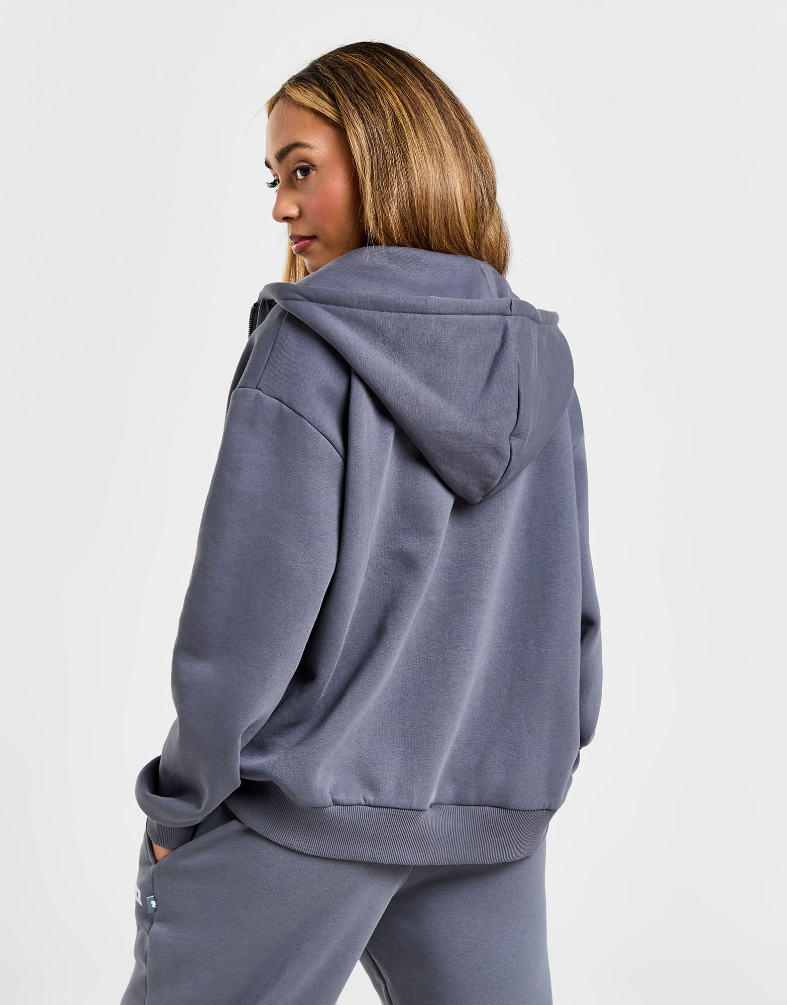 New Balance Sweat à Capuche Zippé Logo Femme