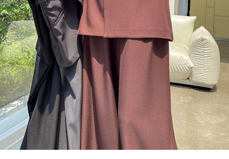 Isaaca - Hoge taille effen rok met riem en wijde pijpen