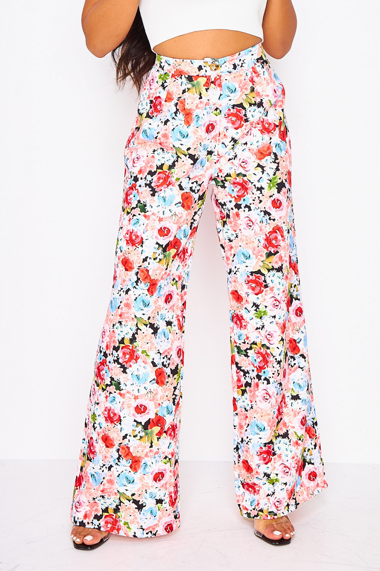 Pantalon à pinces rose imprimé fleuri