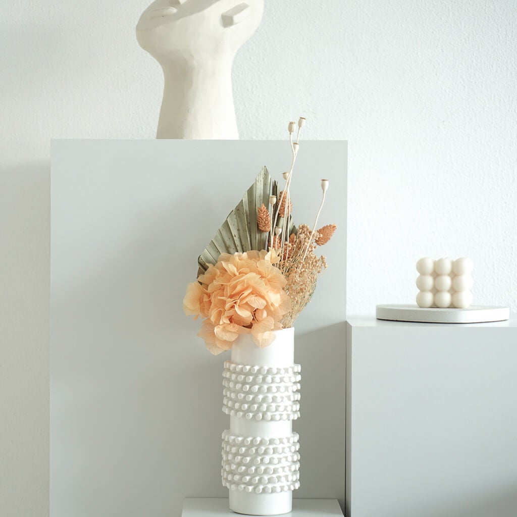 Natuurlijk mooi: een klein boeketje gedroogde bloemen voor subtiele charme.
