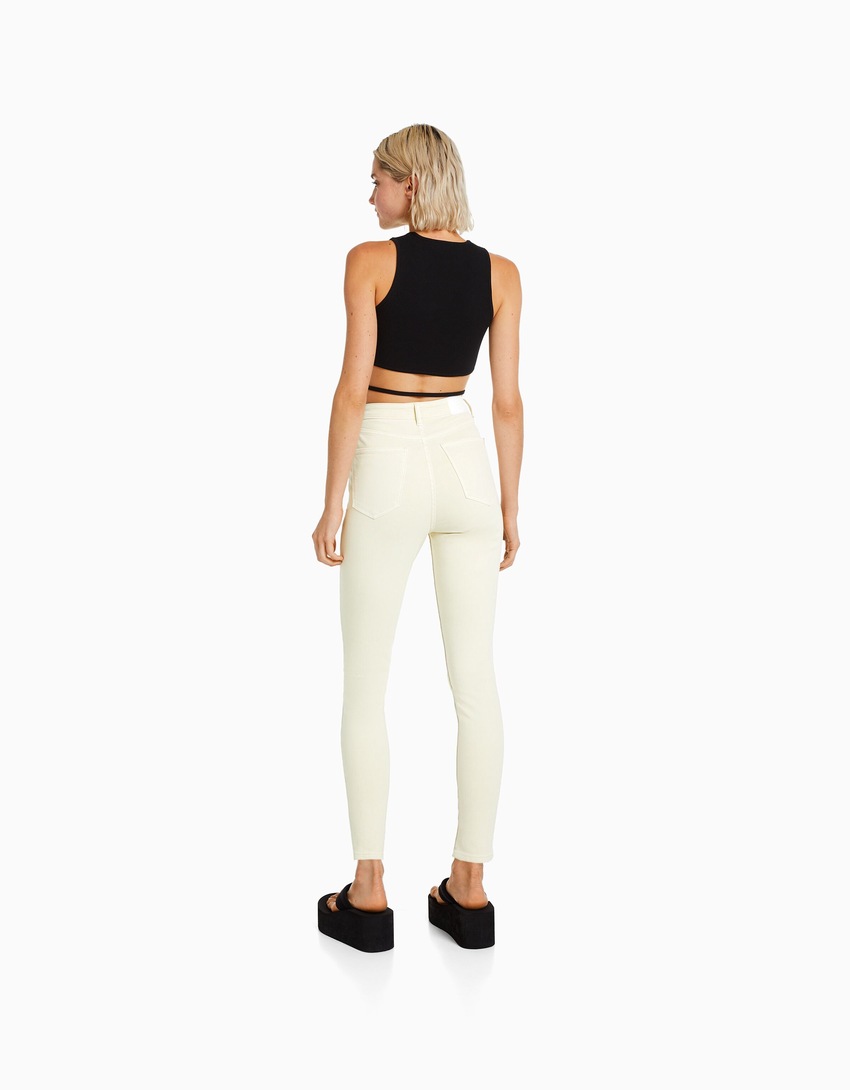calça jeans skinny de cintura super alta