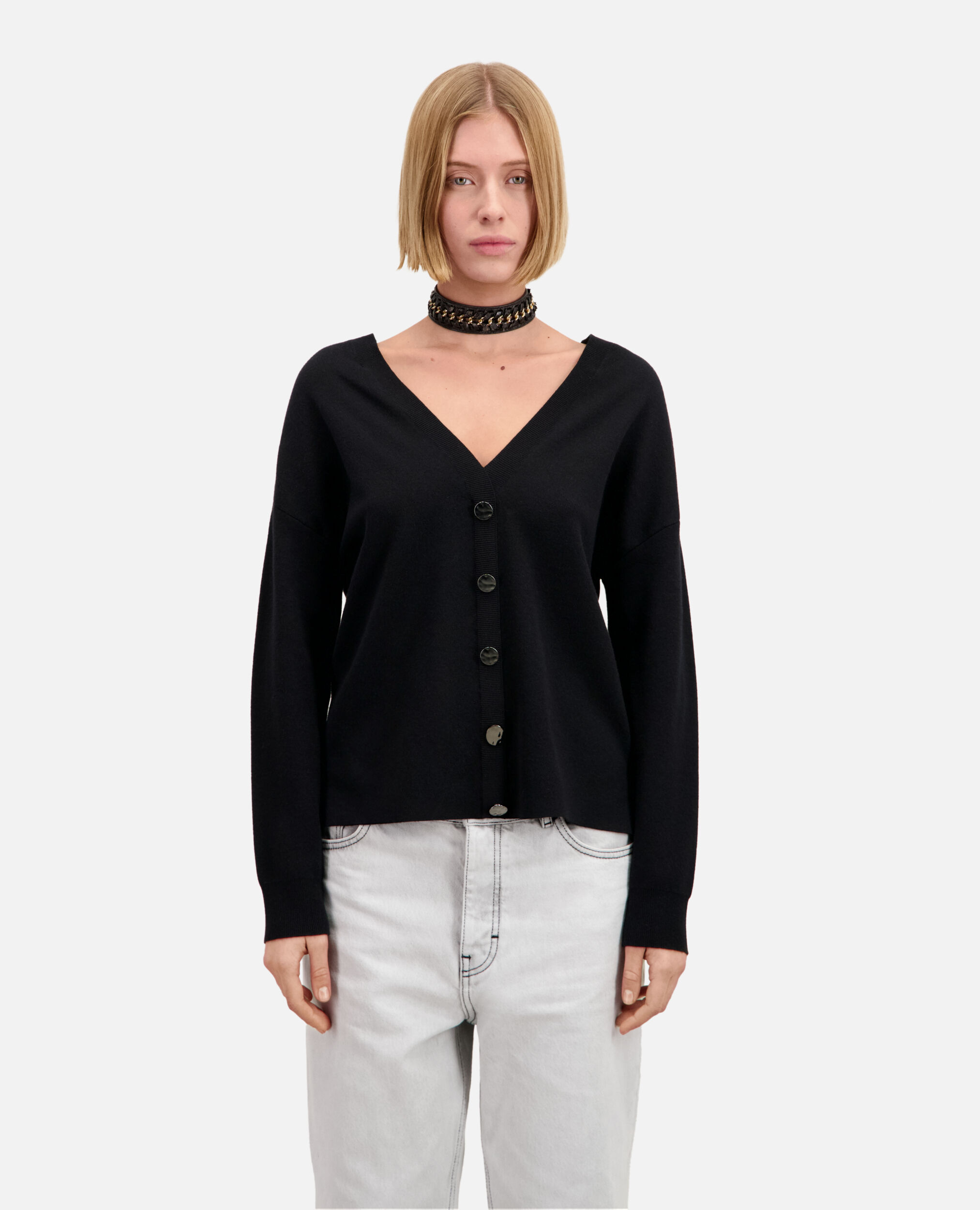 Ecru sweater with buttoning on the back