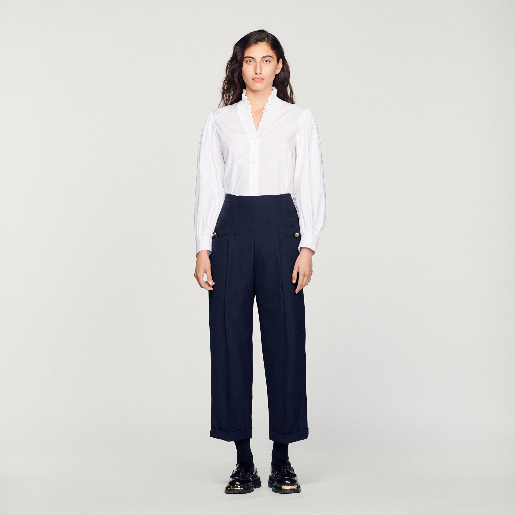 Pantalon á plis