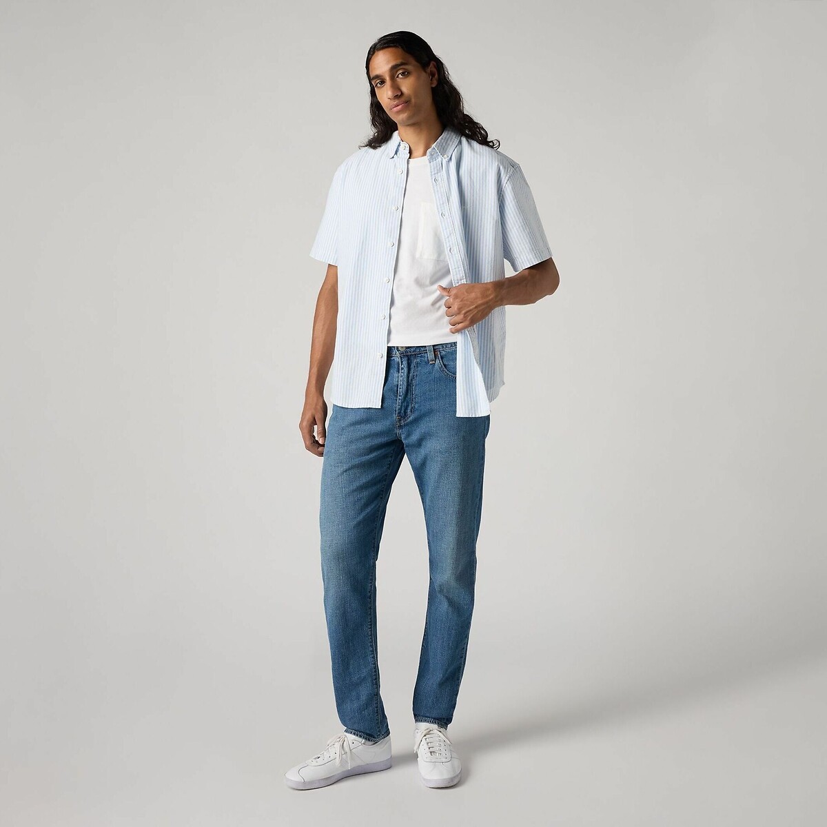 Calça jeans slim Taper 512® da Levi's em algodão e linho.