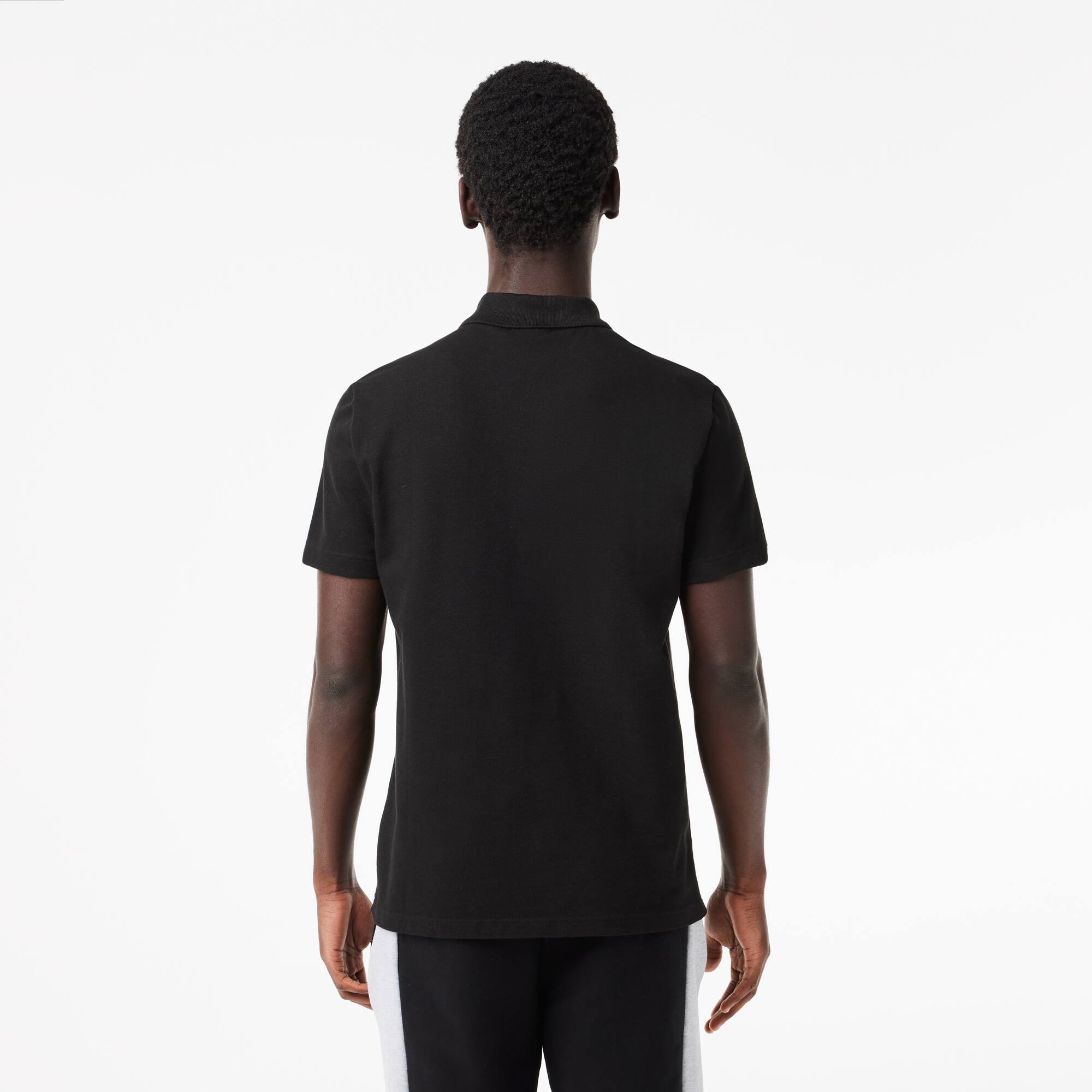Polohemd aus Stretch-Piqué mit Colourblock Kurze Ärmel - Schwarz - Lacoste - Herren