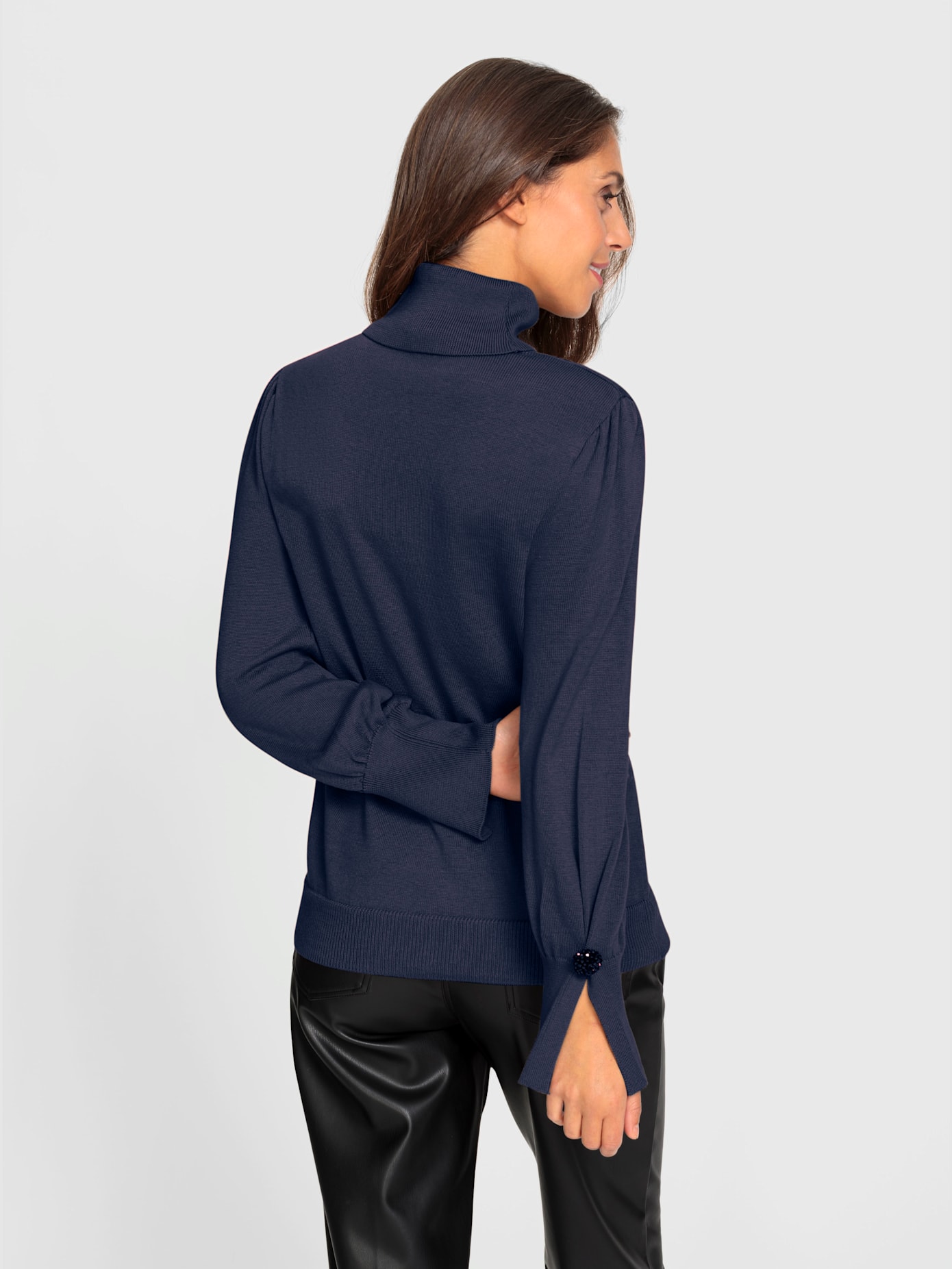 Pull col roulé flatteur