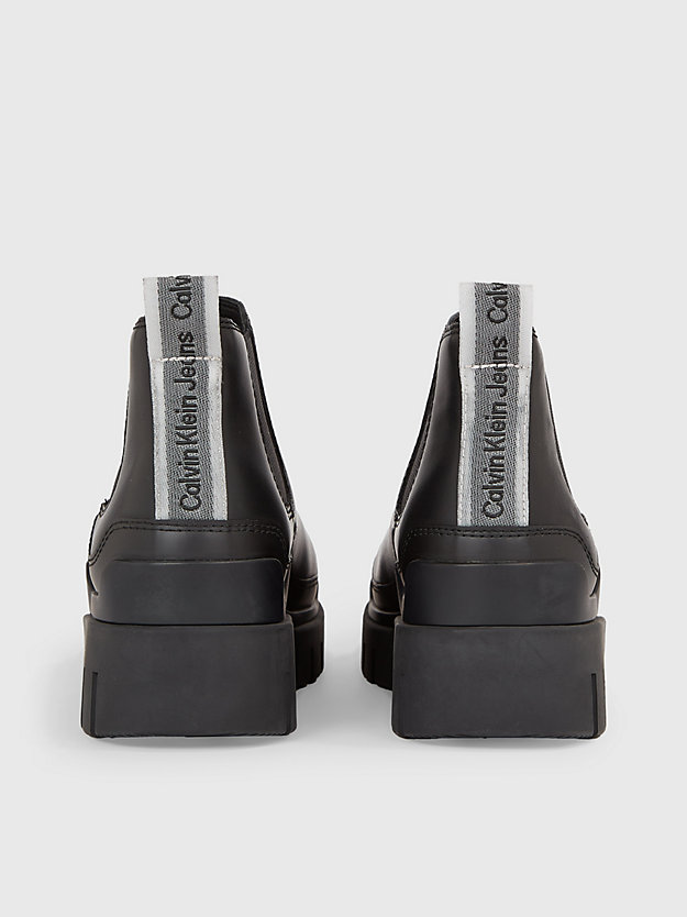 botas de couro até o tornozelo