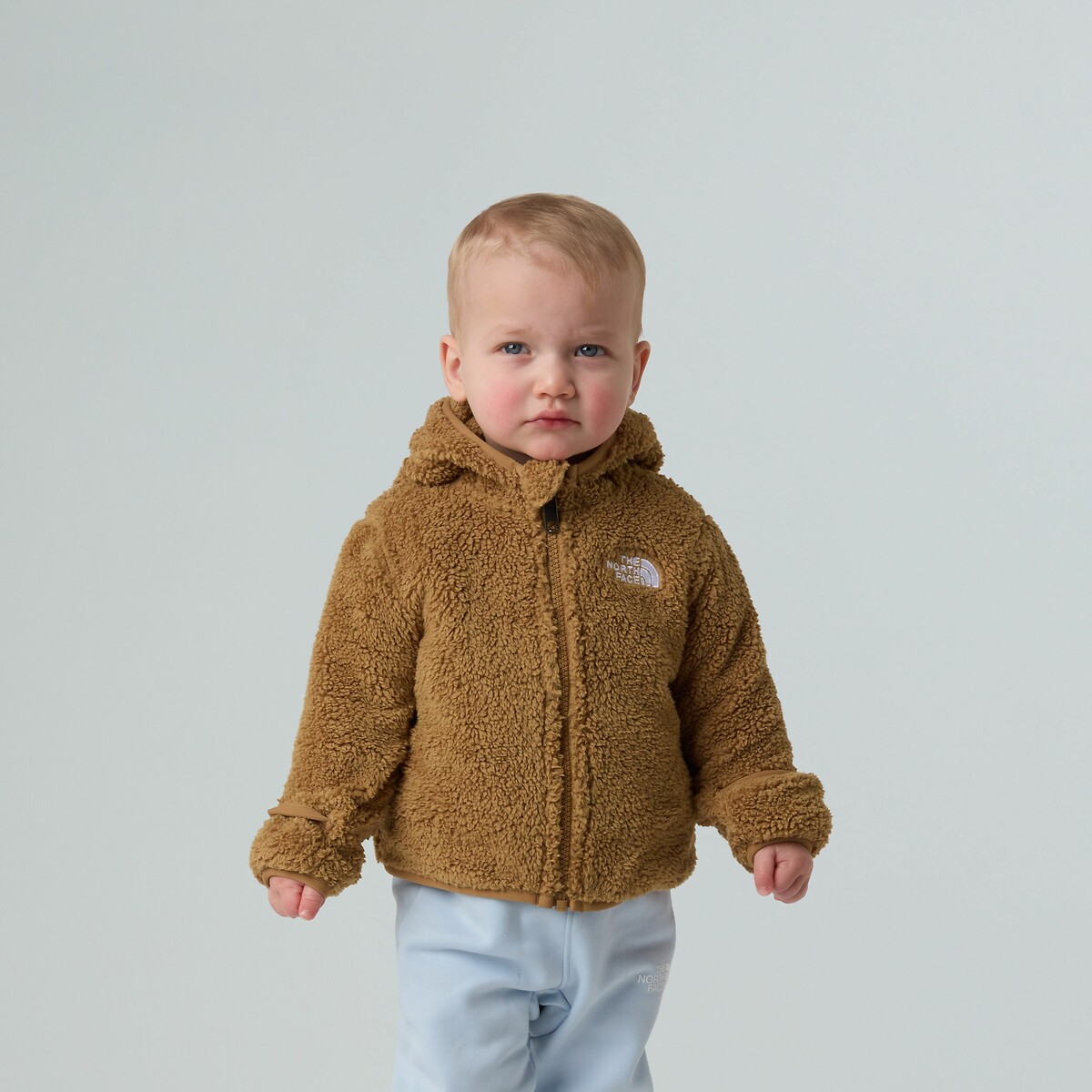 THE NORTH FACE<br>Moletom com capuz em sherpa