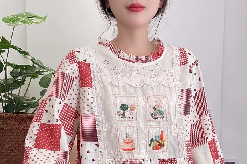 Aigan - Blouse met pofmouwen en kantversiering