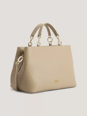 Bolsa de couro de luxo com pingente de brasão