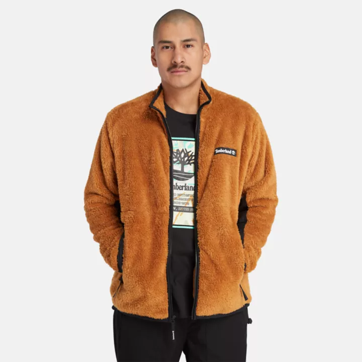 Jaqueta de lã polar de pelo alto, unissex, na cor laranja.