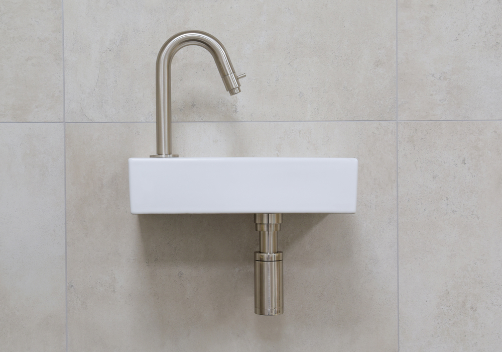 Mueller Mini Rhea wit fonteinset met RVS gebogen fonteinkraan links