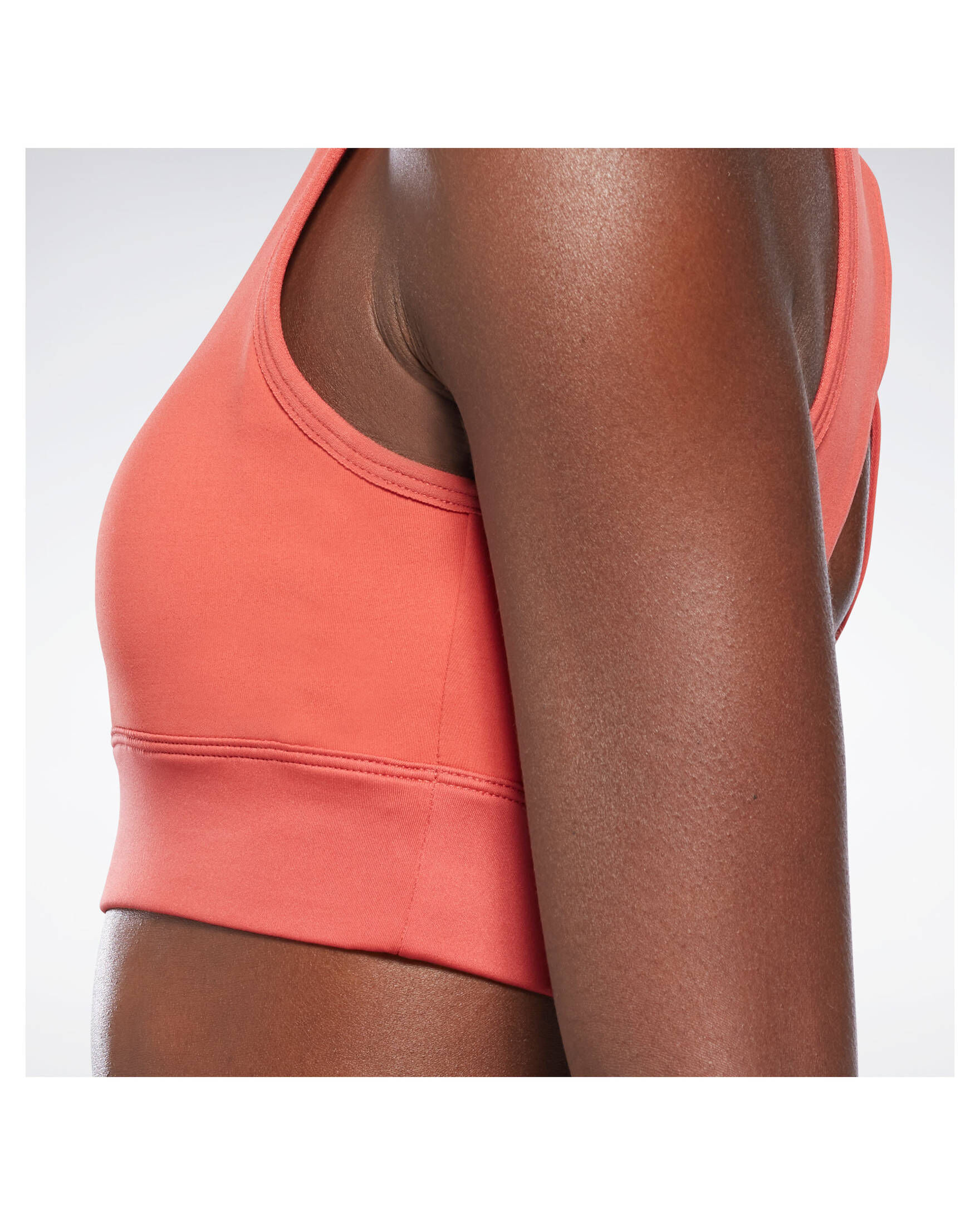 Reebok| Damen Trainingsbustier STUDIO BEYOND THE SWEAT CROP